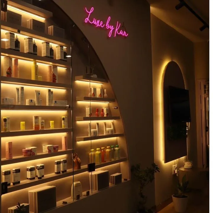 Luxe by Kan skincare shelf inside Skulpted by Kan